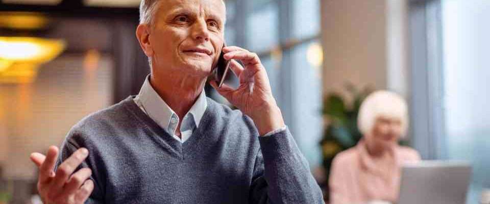 Man discussing ear health concerns with a pharmacy professional